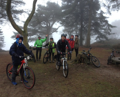 mountain bikers on Leith Hill summit